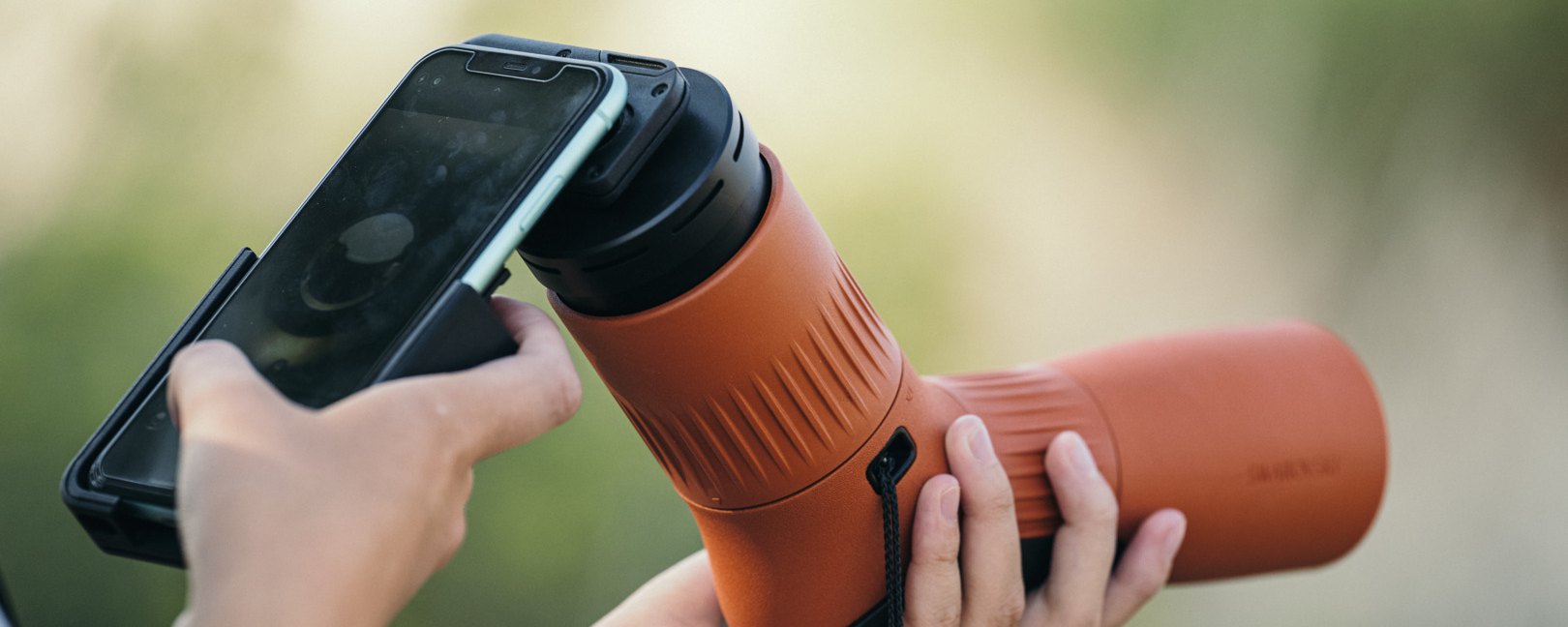 Smartphone attached to a Swarovski spotting scope with the VPA 2 adapter